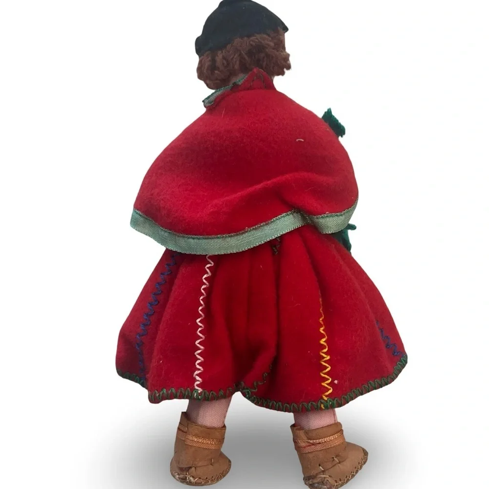 Handcrafted Red Doll with Green Accents